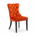 Chaise en velours orange avec pieds en